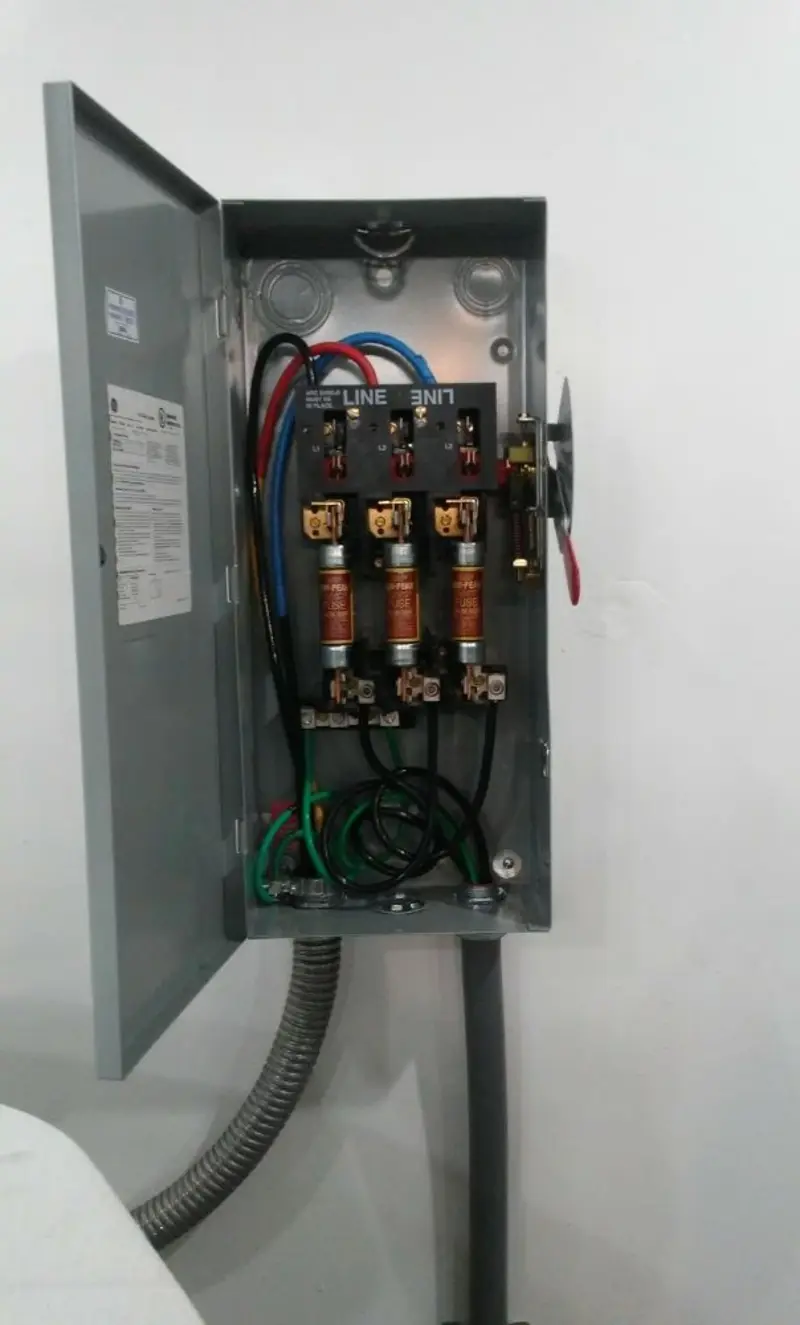 Three-phase disconnect switch installed for Smoke Detector Installation in Denair