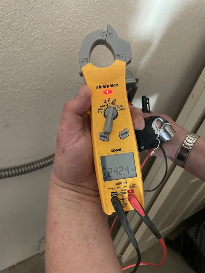 Voltage testing with clamp meter during Generator Installation in Denair